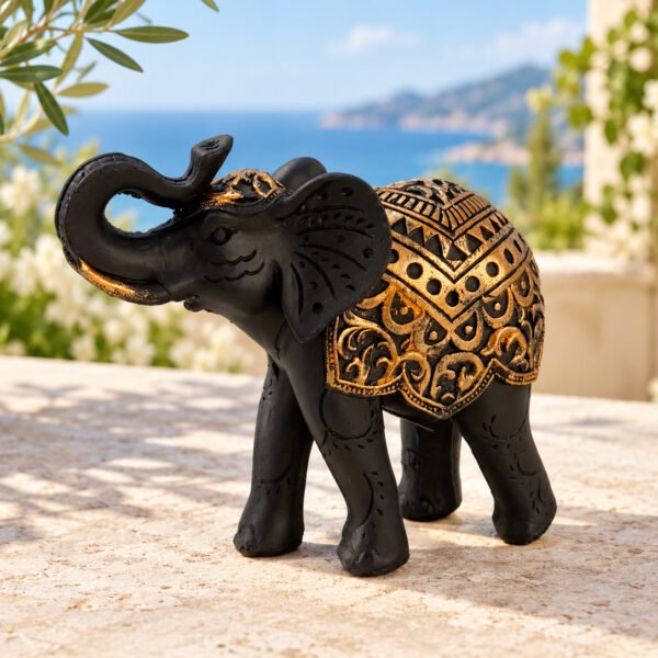 Elefante negro y oro 8 cm